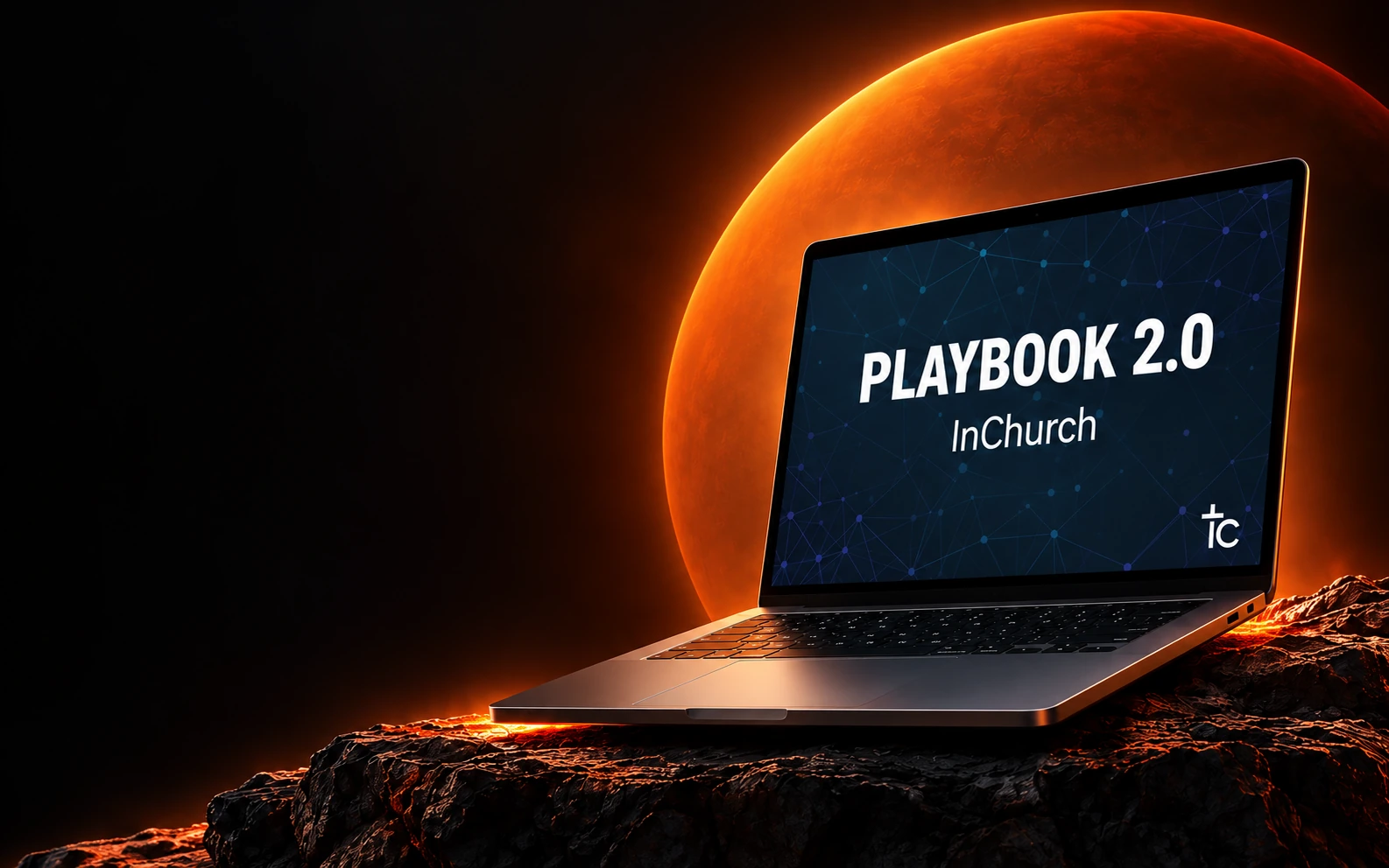 Notebook com o Playbook 2.0 da InChurch, sobre rochas e diante de uma esfera âmbar